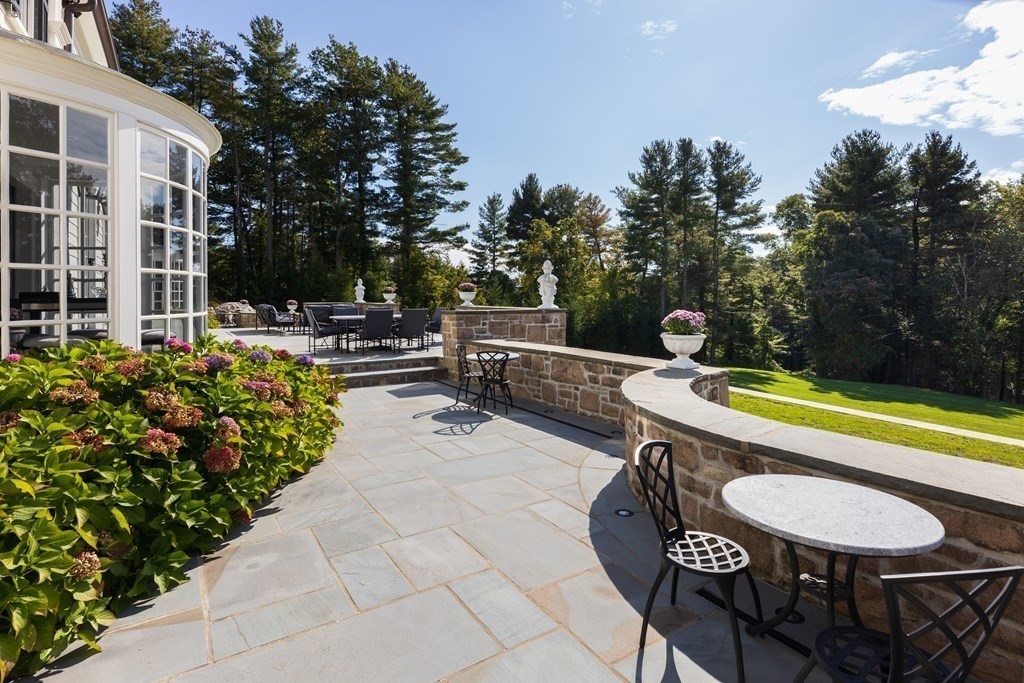32 Parkman Way Needham, MA 02492 - Photo 16 of 35 a view of a chairs and table in the patio