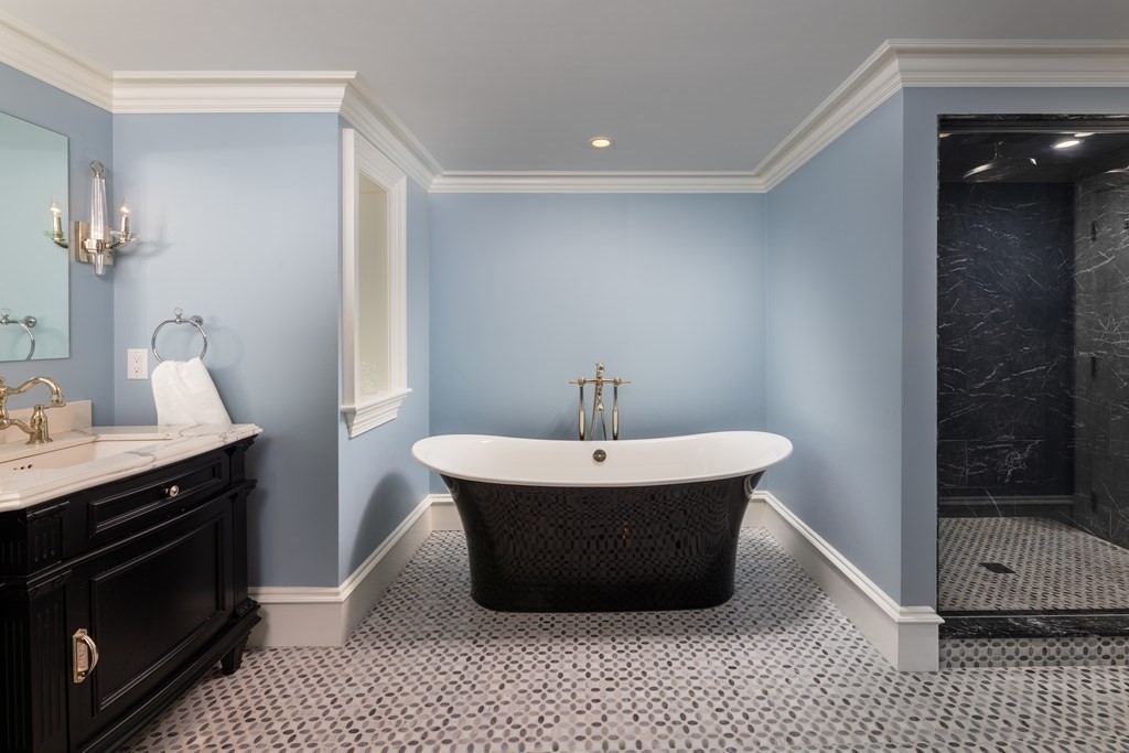 32 Parkman Way Needham, MA 02492 - Photo 19 of 35 a bathroom with a sink and a mirror