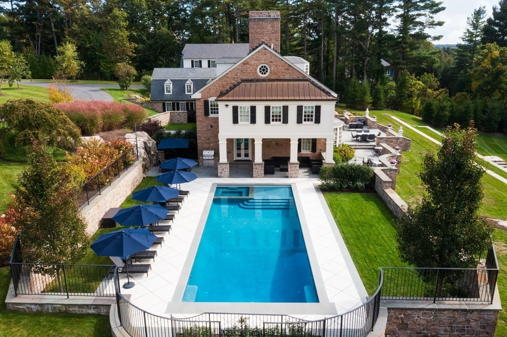 32 Parkman Way Needham, MA 02492 - Photo 2 of 35 a aerial view of a house with swimming pool