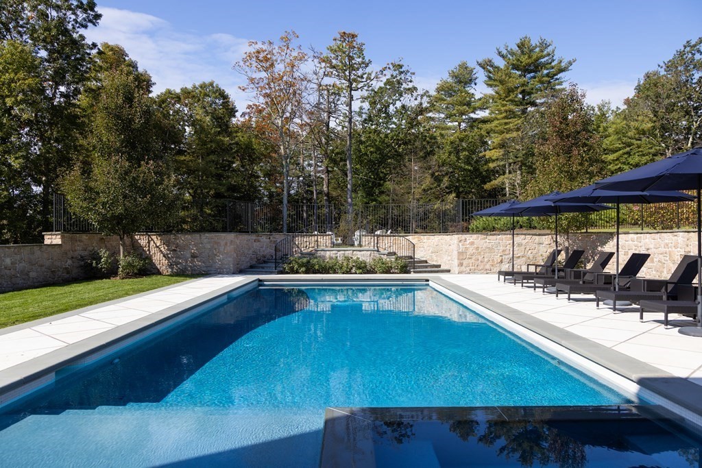 32 Parkman Way Needham, MA 02492 - Photo 32 of 35 a view of a backyard with sitting area