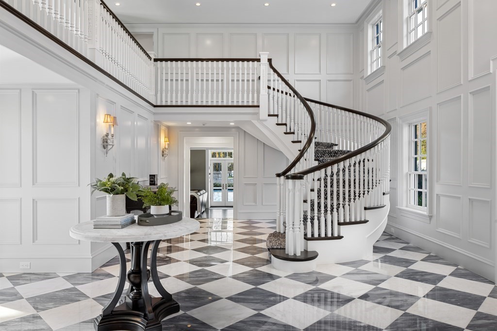32 Parkman Way Needham, MA 02492 - Photo 4 of 35 a view of entryway with dining room and stairs