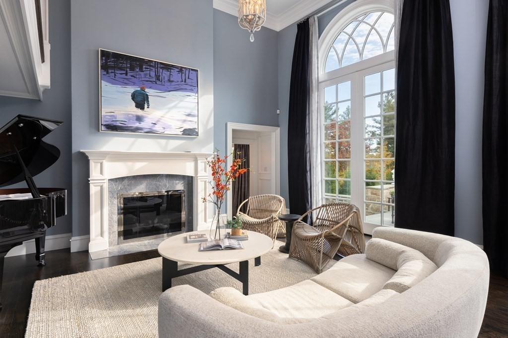 32 Parkman Way Needham, MA 02492 - Photo 6 of 35 a living room with furniture and a fireplace