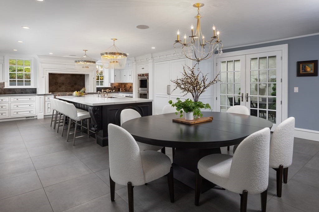 32 Parkman Way Needham, MA 02492 - Photo 9 of 35 a view of a dining room with furniture and wooden floor