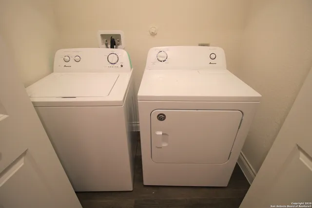a utility room with dryer and washer