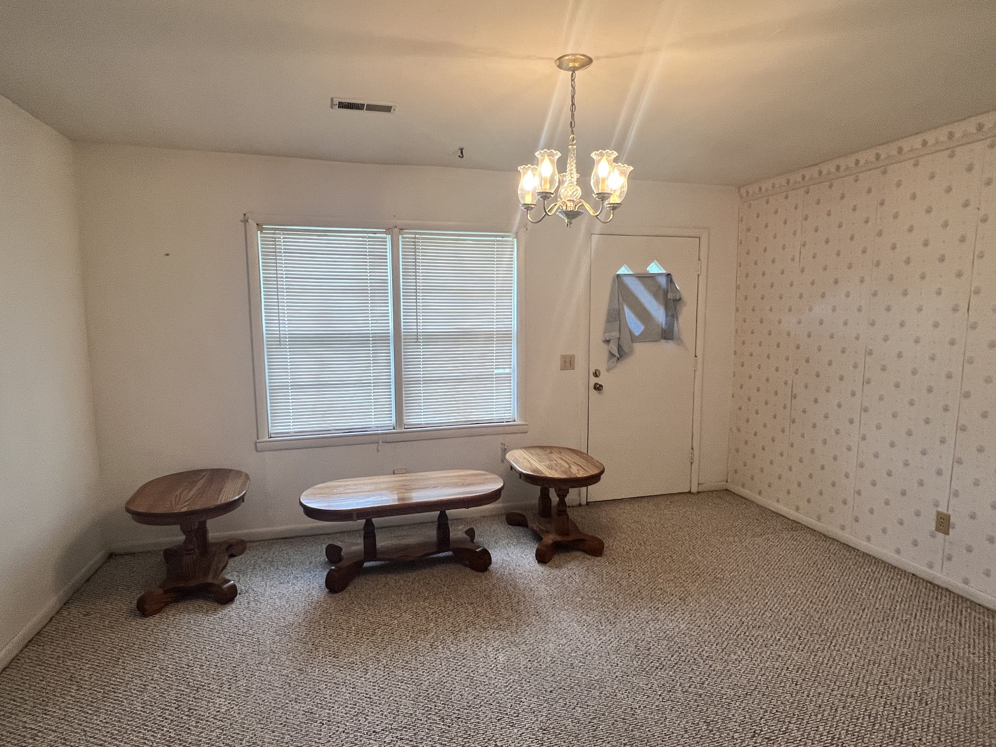 82 Matts Hollow Road Manchester, TN 37355 - Photo 3 of 10 a view of a room with gym equipment and a window