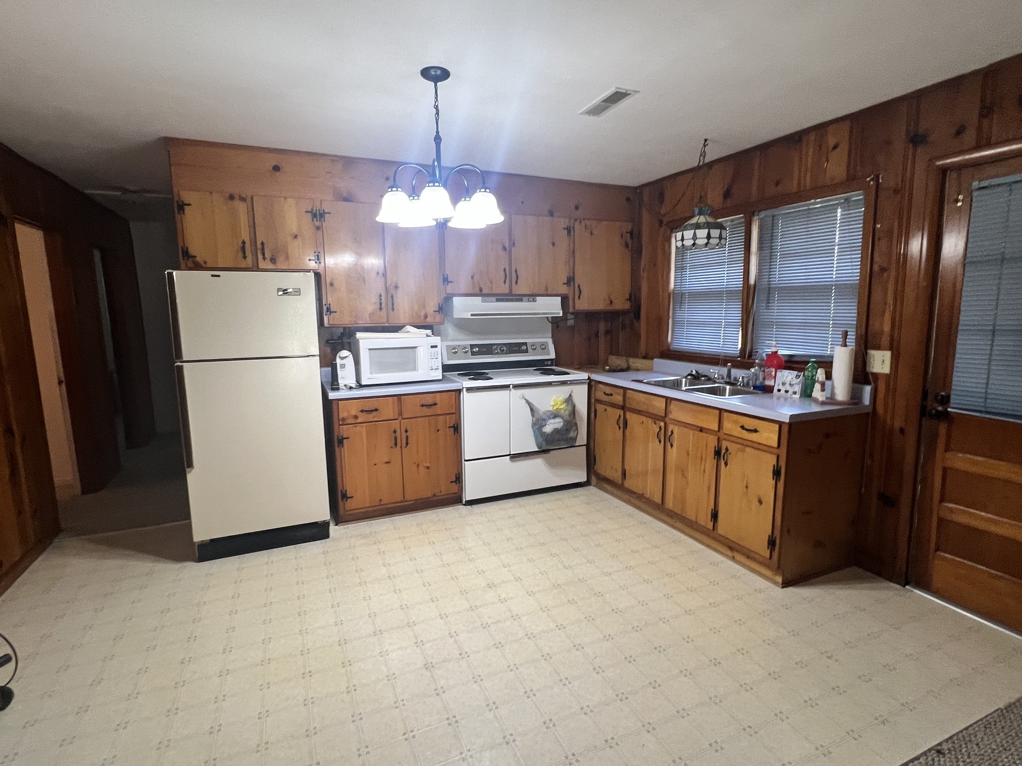 82 Matts Hollow Road Manchester, TN 37355 - Photo 4 of 10 a kitchen with stainless steel appliances a stove a refrigerator and a sink