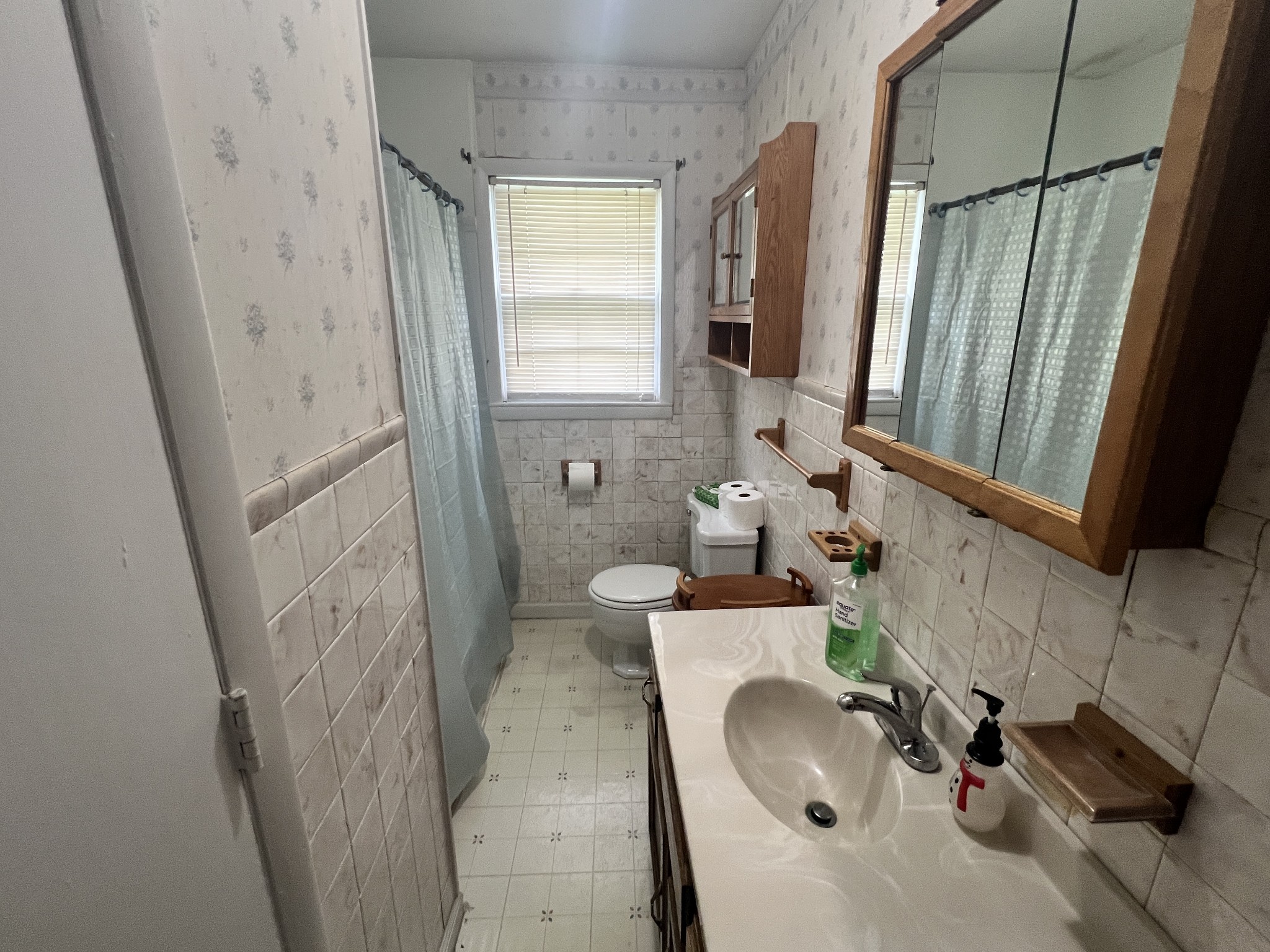 82 Matts Hollow Road Manchester, TN 37355 - Photo 9 of 10 a bathroom with a sink a toilet and a mirror