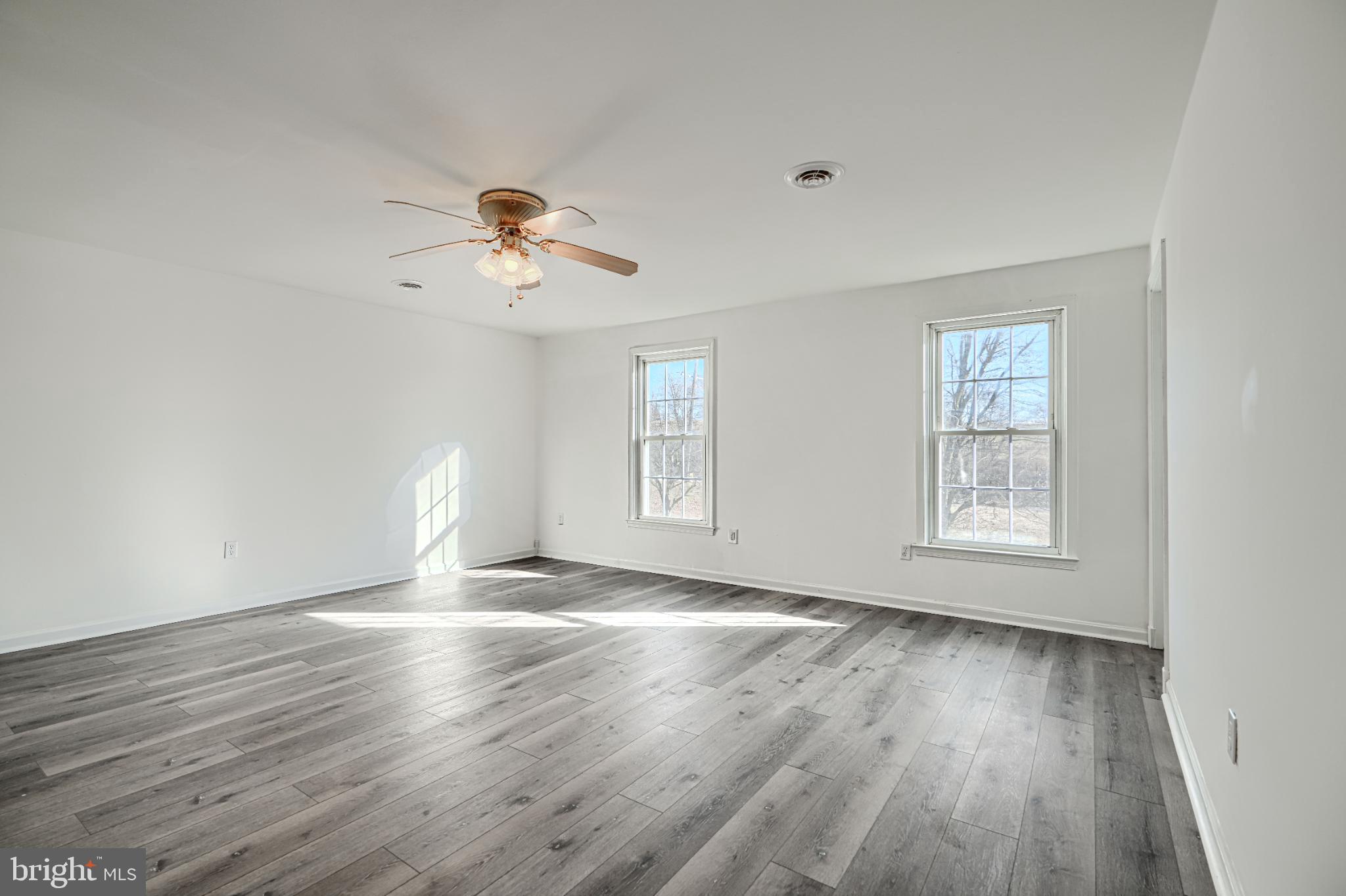 1216 Bachmans Valley Road Westminster, MD 21158 - Photo 44 of 70 a view of room window and wooden floor