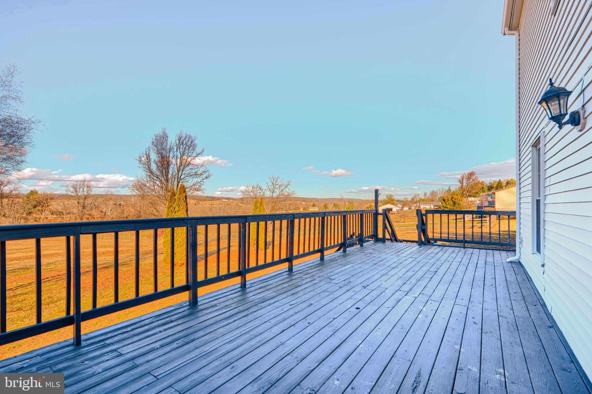 1216 Bachmans Valley Road Westminster, MD 21158 - Photo 63 of 70 a view of balcony with wooden floor