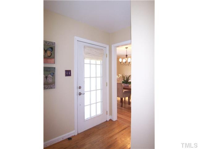 104 West Whitaker Mill Road Raleigh, NC 27608 - Photo 3 of 25 a view of a room that has a window in it