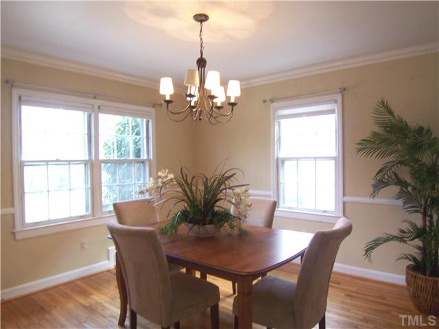 104 West Whitaker Mill Road Raleigh, NC 27608 - Photo 6 of 25 a view of a dining room with furniture window and outside view