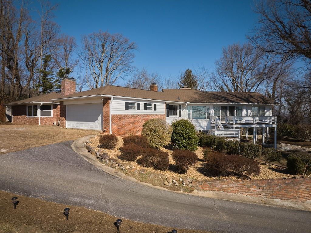 2871 Hogback Mountain Road Tryon, NC 28782 - Photo 1 of 33 a front view of a house with a porch