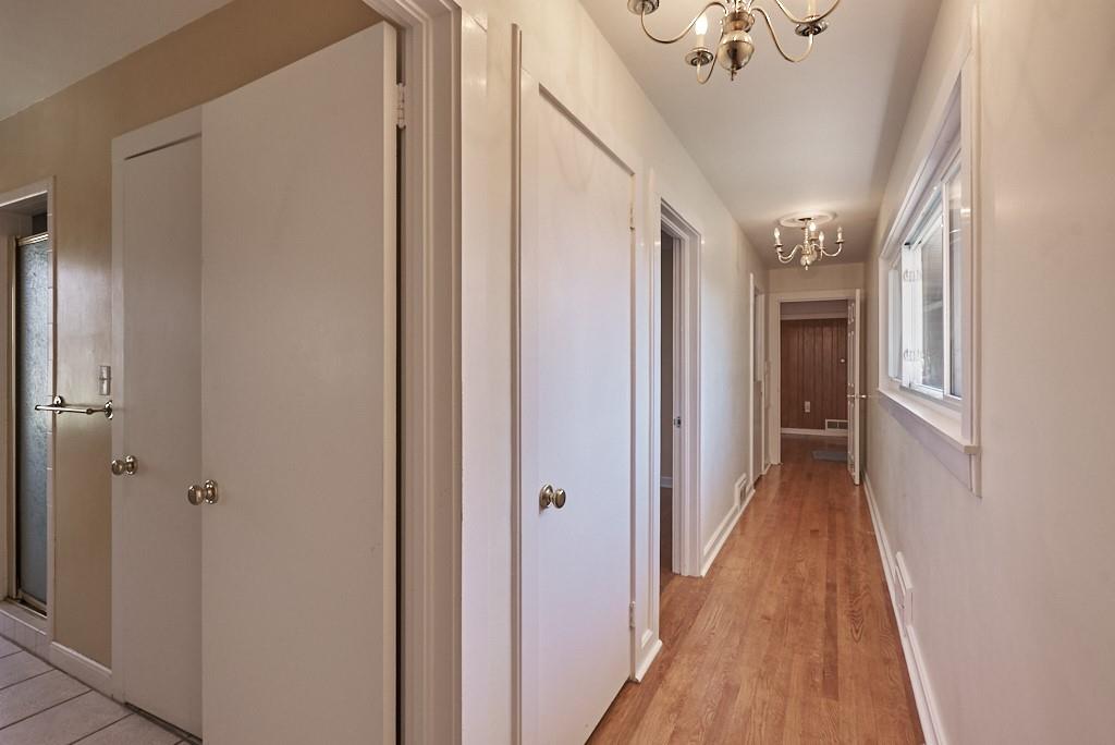 2871 Hogback Mountain Road Tryon, NC 28782 - Photo 29 of 33 a view of a hallway with wooden floor and staircase
