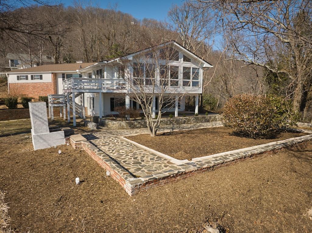 2871 Hogback Mountain Road Tryon, NC 28782 - Photo 7 of 33 a front view of a house with swimming pool