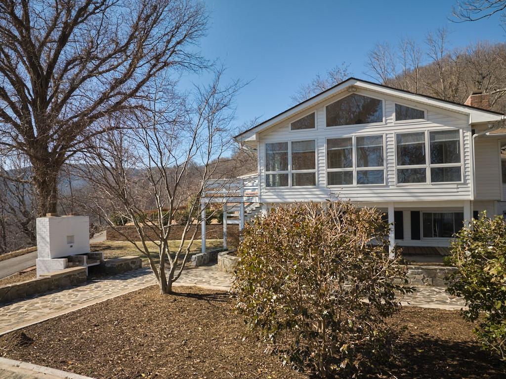 2871 Hogback Mountain Road Tryon, NC 28782 - Photo 8 of 33 a front view of a house with garden