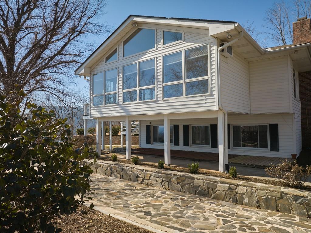 2871 Hogback Mountain Road Tryon, NC 28782 - Photo 9 of 33 a front view of a house with a porch