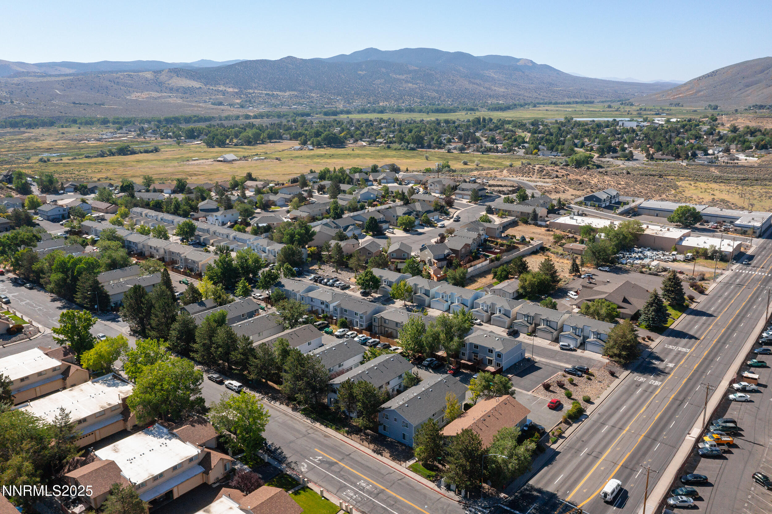 3913 Pheasant Drive Carson City, NV 89701 - Photo 7 of 12 an aerial view of residential houses and outdoor space