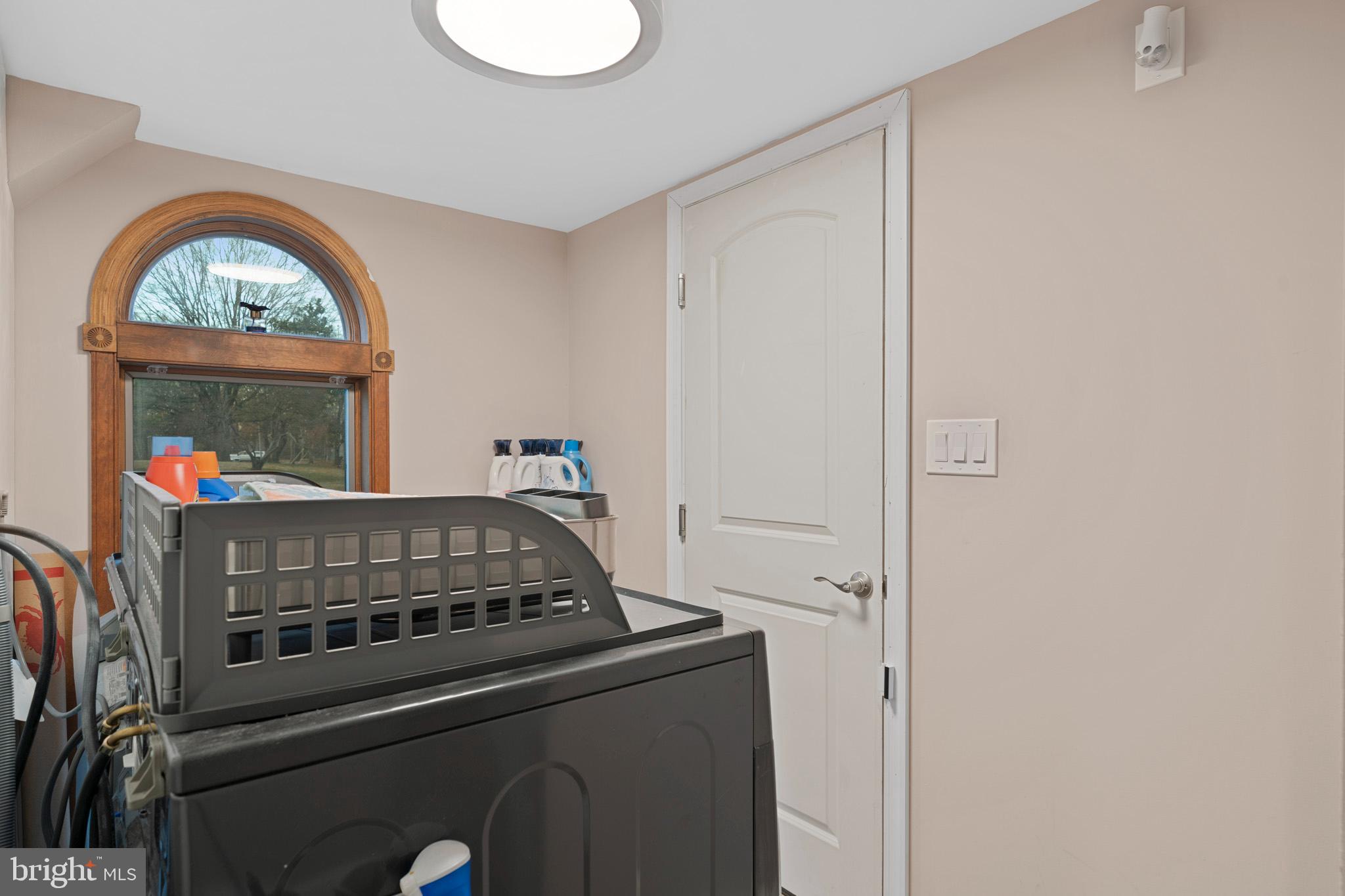 13340 Rousby Hall Road Lusby, MD 20657 - Photo 32 of 71 Main level laundry room