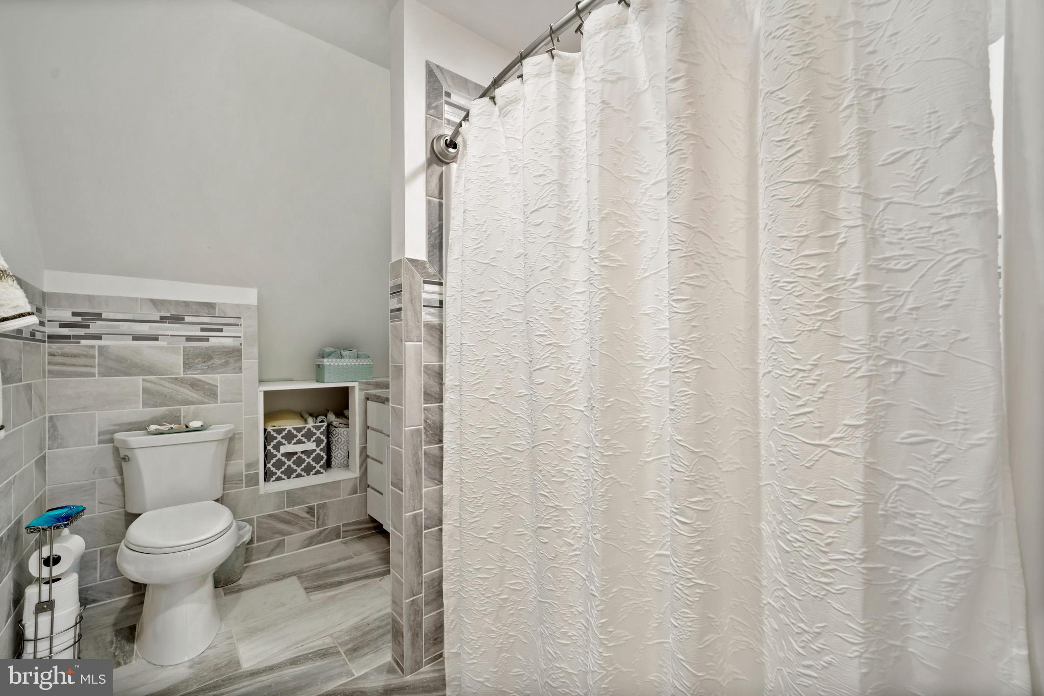 13340 Rousby Hall Road Lusby, MD 20657 - Photo 52 of 71 Second level hallway bathroom