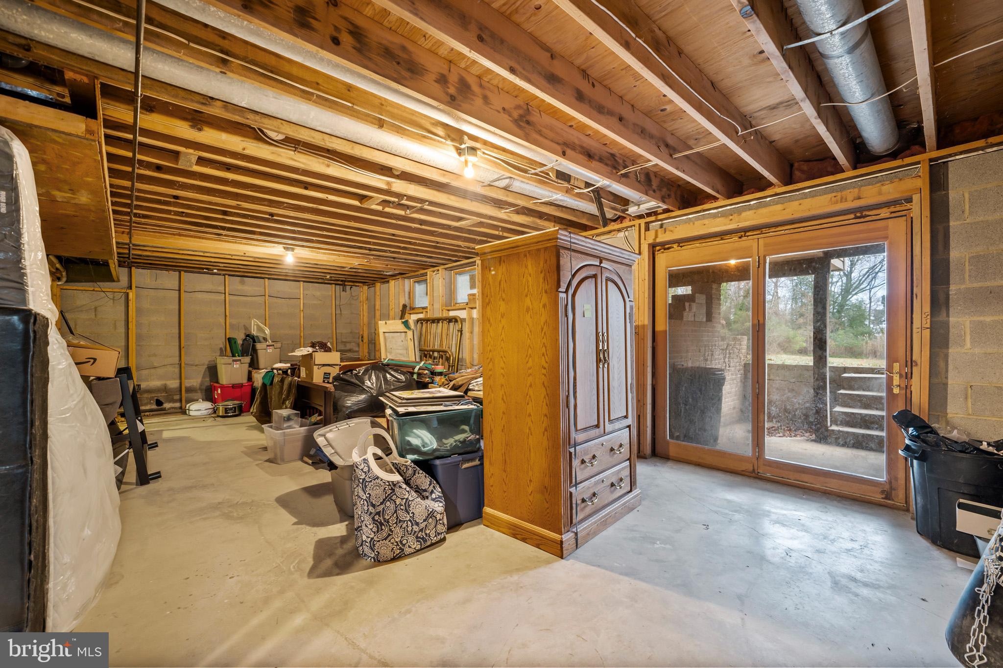 13340 Rousby Hall Road Lusby, MD 20657 - Photo 56 of 71 Slider with outside access