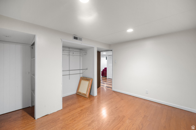 3233 Jean Street Magna, UT 84044 - Photo 26 of 33 Hardwood flooring throughout this room featuring recessed lighting