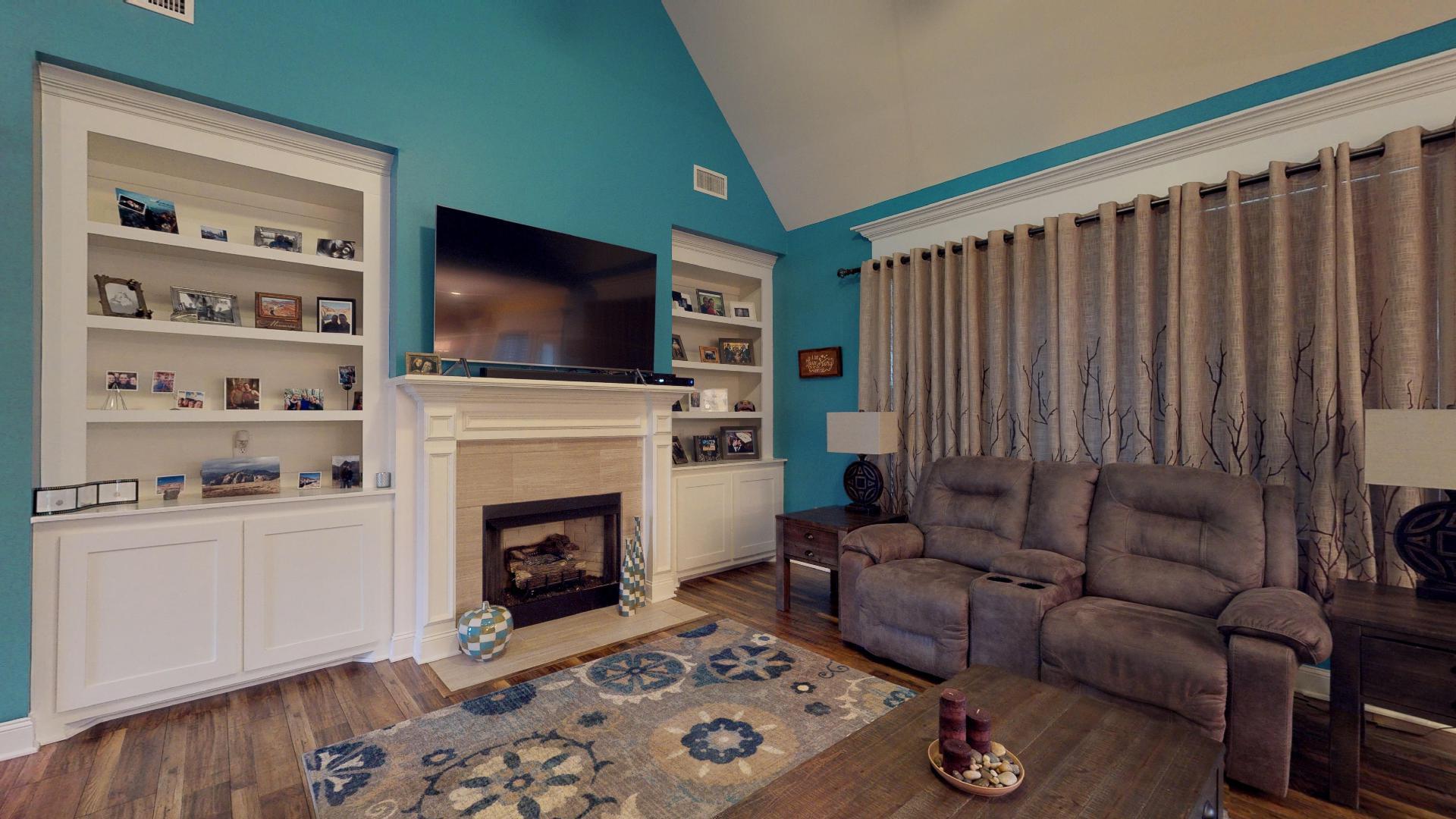 1215 Rimrock Road Smyrna, TN 37167 - Photo 7 of 30 Spacious living room offers built-ins and gas fireplace