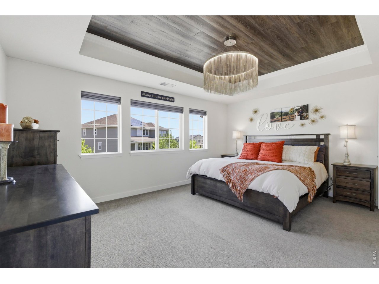2910 Water View Street Timnath, CO 80547 - Photo 22 of 50 a bedroom with a large bed and a large window