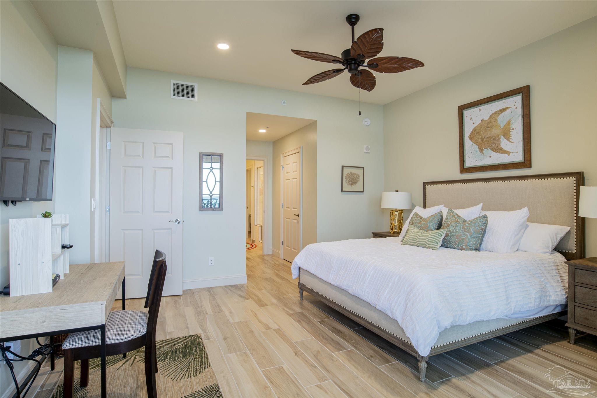 13333 Johnson Beach Road, Unit 302 Perdido Key, FL 32507 - Photo 17 of 50 Master Bedroom with Seating at Desk