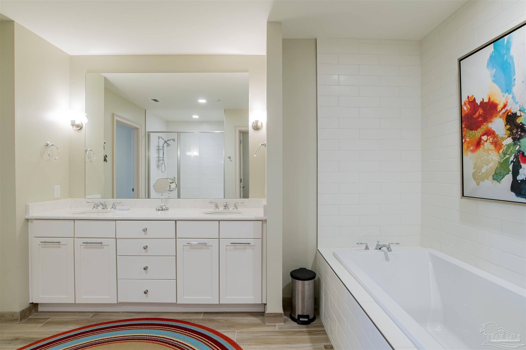 13333 Johnson Beach Road, Unit 302 Perdido Key, FL 32507 - Photo 19 of 50 Master Bathroom with Soaking Tub & Vanities