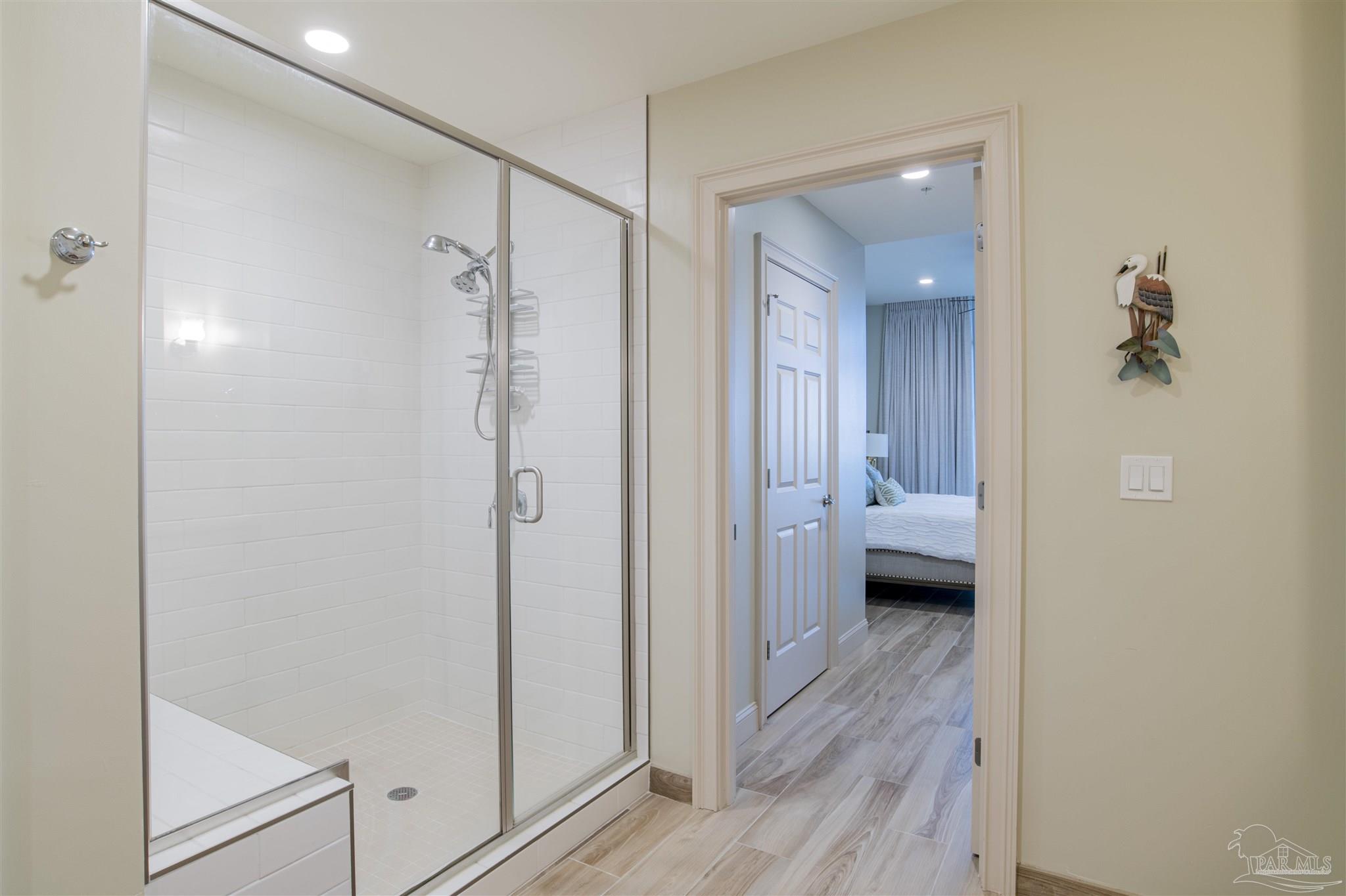 13333 Johnson Beach Road, Unit 302 Perdido Key, FL 32507 - Photo 20 of 50 Master Bathroom Tiled Walk-In Shower