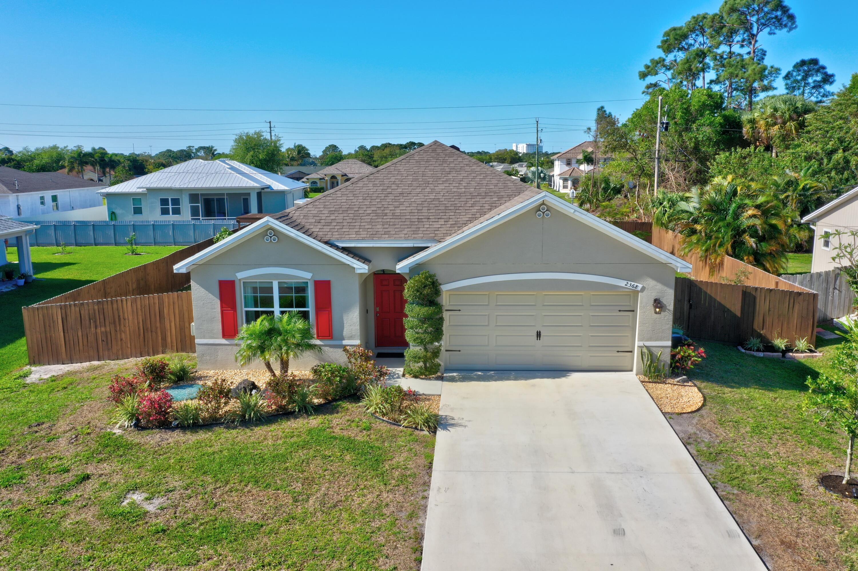 2368 Southwest Neal Road Port St. Lucie, FL 34953 - Photo 2 of 47 Front