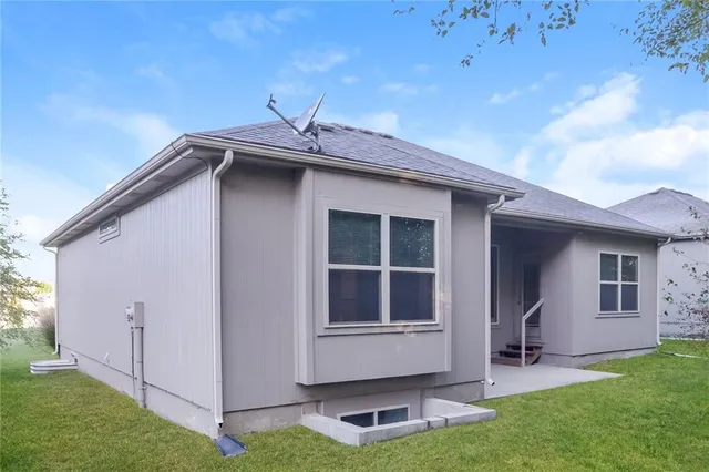 $2,405 | 215 Northeast Katie Court, Grain Valley, MO 64029