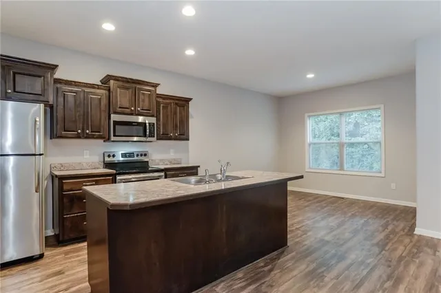 $2,405 | 215 Northeast Katie Court, Grain Valley, MO 64029