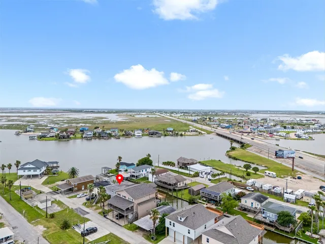 a view of swimming pool with outdoor seating