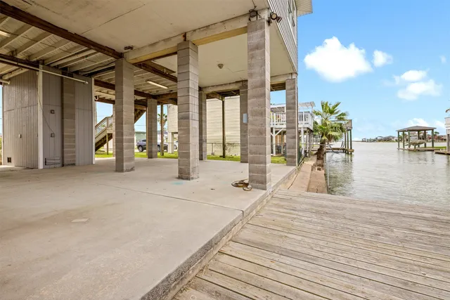 a kitchen with a sink cabinets and window