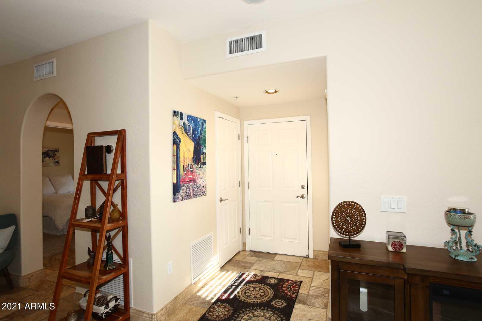 3935 East Rough Rider Road, Unit 1206 Phoenix, AZ 85050 - Photo 6 of 54 Foyer