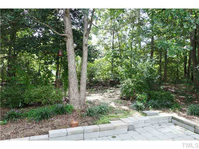 4420 Labrador Drive Raleigh, NC 27616 - Photo 17 of 21 a view of a yard with plants and large trees