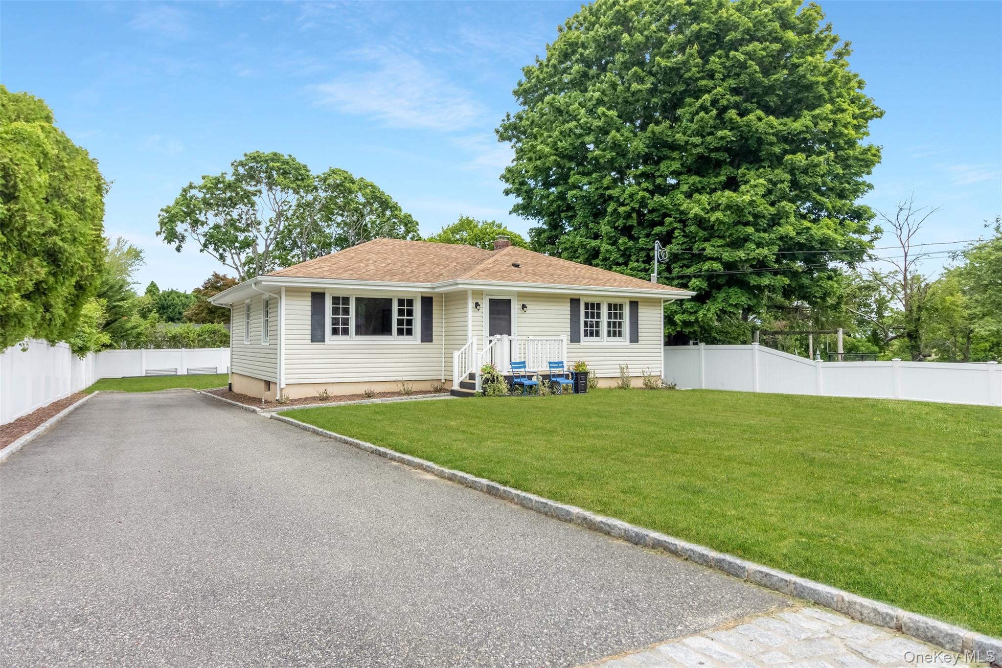 315 Wicks Road New Suffolk, NY 11956 - Photo 3 of 28 a view of a house with a yard