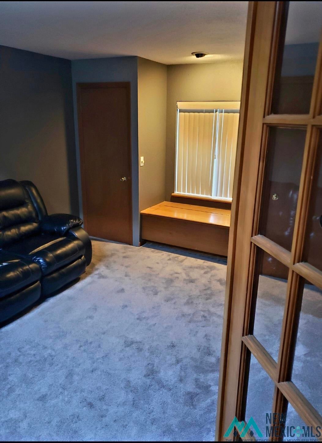 1375 Brilliant Street Raton, NM 87740 - Photo 7 of 19 Living area featuring carpet