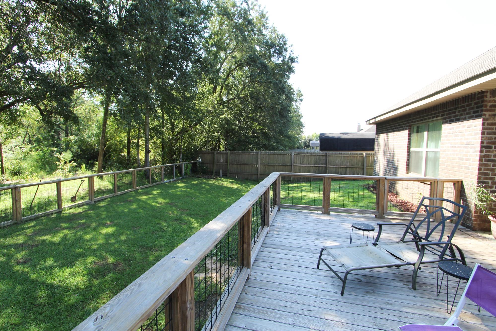 15082 Troon Drive Foley, AL 36535 - Photo 27 of 34 Back yard deck