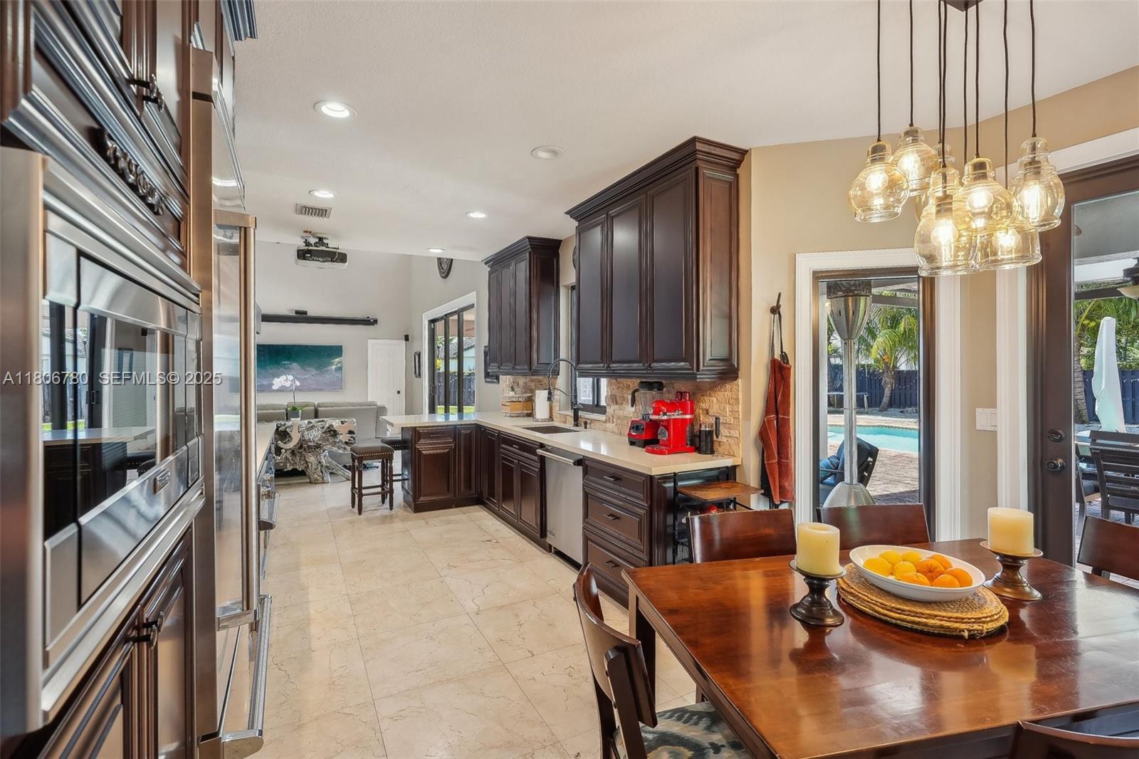 11898 Southwest 74th Terrace Miami, FL 33183 - Photo 20 of 68 a view of a dining room with furniture window and wooden floor
