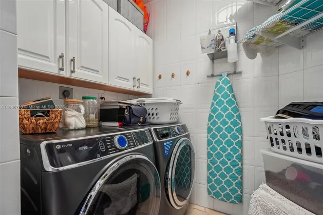 a utility room with dryer and washer