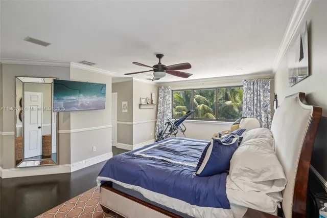 a bed room with a bed and a window