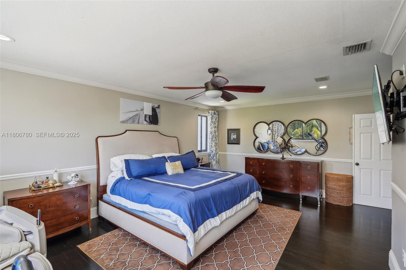 11898 Southwest 74th Terrace Miami, FL 33183 - Photo 34 of 68 a bedroom with a bed and wooden floor