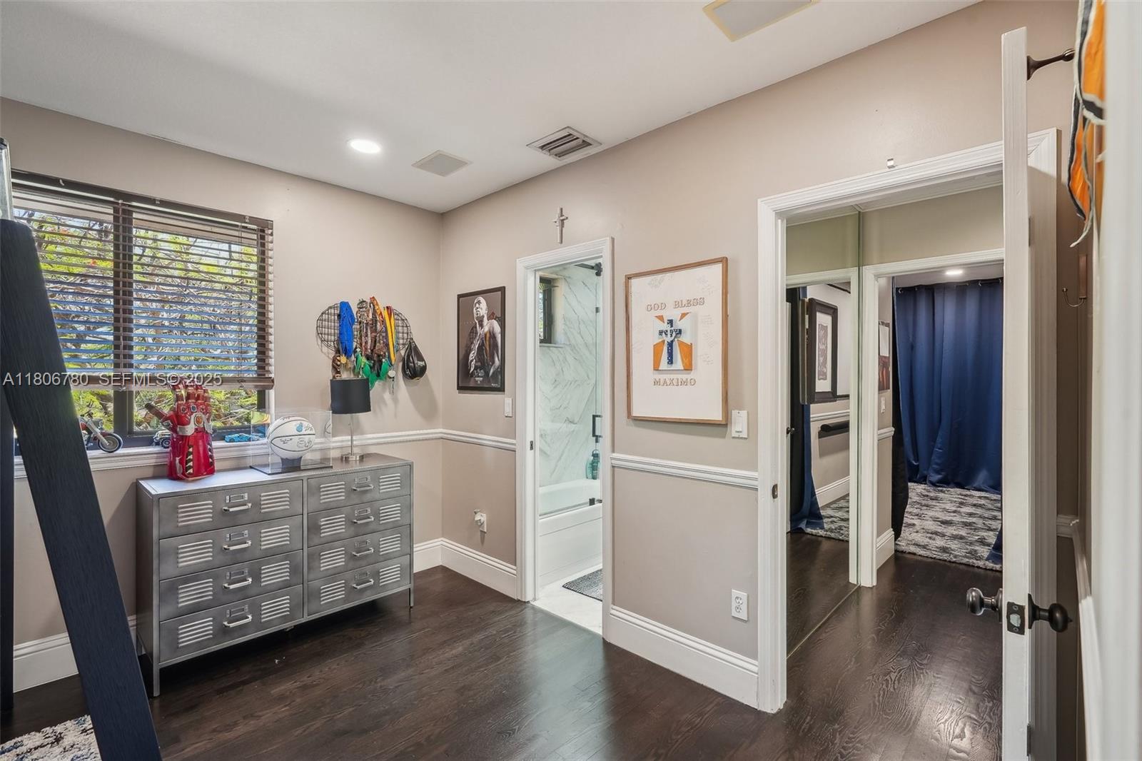 11898 Southwest 74th Terrace Miami, FL 33183 - Photo 46 of 68 a living room with furniture and a window