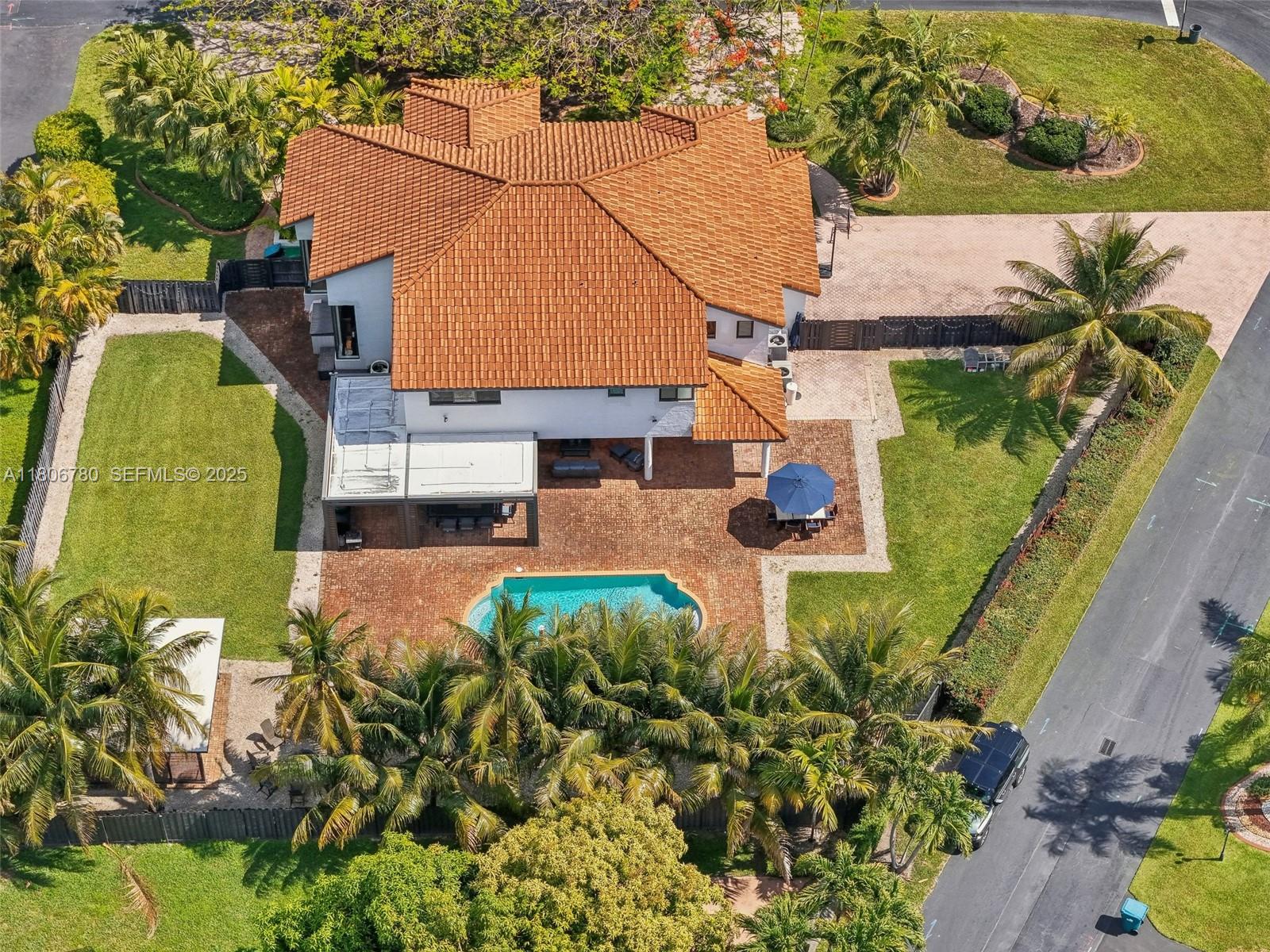 11898 Southwest 74th Terrace Miami, FL 33183 - Photo 61 of 68 an aerial view of a house with a yard and potted plants