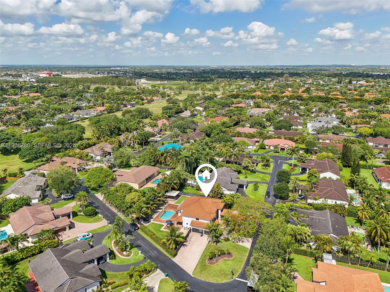 11898 Southwest 74th Terrace Miami, FL 33183 - Photo 65 of 68 an aerial view of residential houses with outdoor space