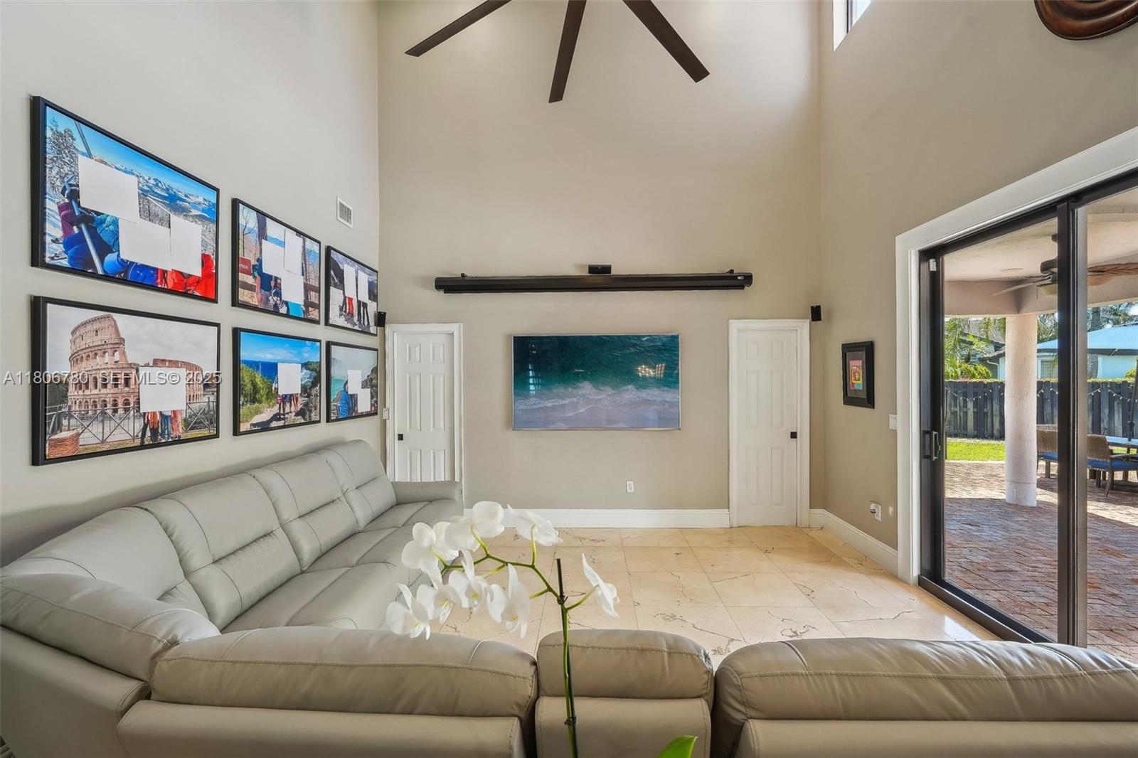 11898 Southwest 74th Terrace Miami, FL 33183 - Photo 7 of 68 a living room with furniture and a fireplace