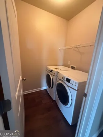 a bathroom with a sink a toilet a shower and a mirror