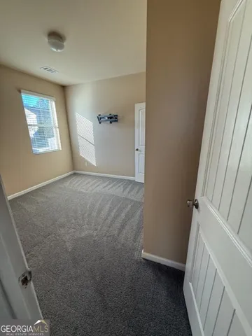 a view of an ocean with a house